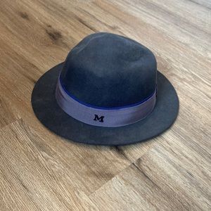 Dark grey, light grey, and royal blue felt hat. 10% wool. One size never worn